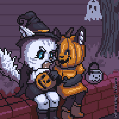 A white cat wearing a witch costume and a black cat wearing a pumpkin head and orange dress are looking in the witch's candy bucket while sitting on a brick walled yard edge. The white cat looks angry with her tail puffed up. There is a tree in the backg